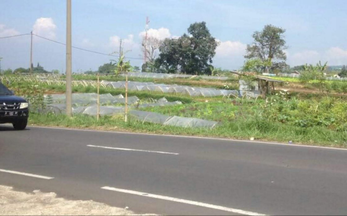 Di jual tanah darat di pinggir jalan Nasional