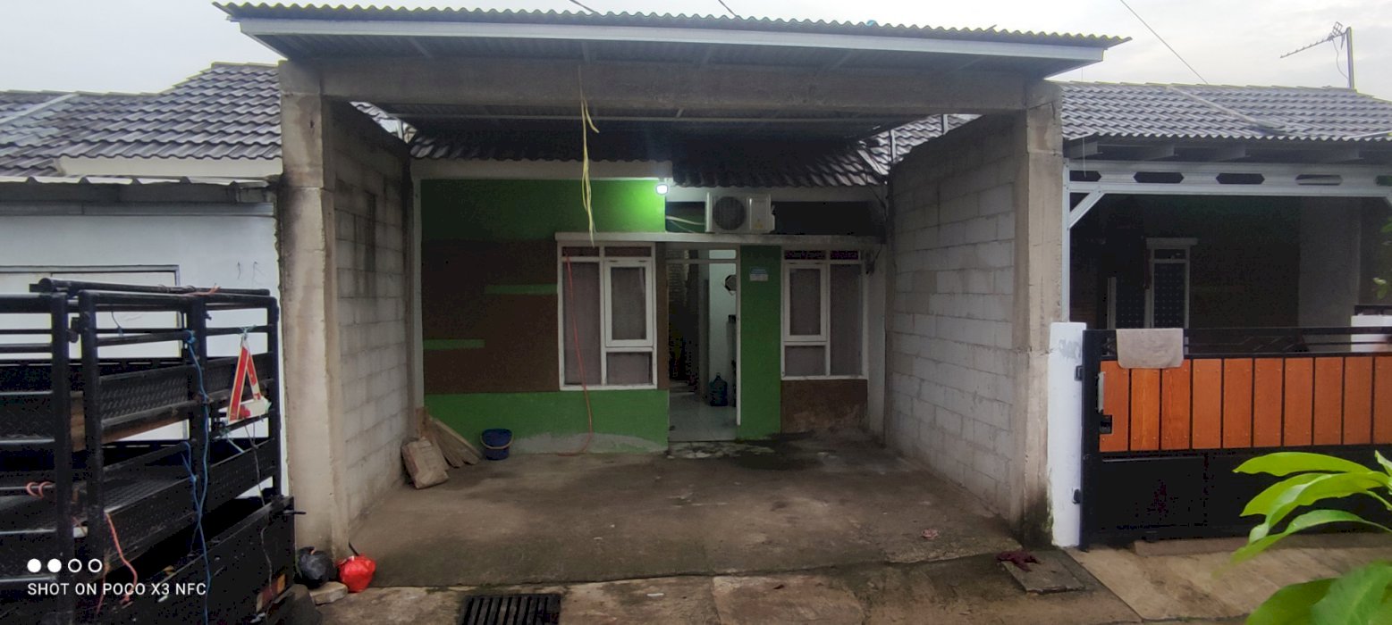 Over kredit perumahan