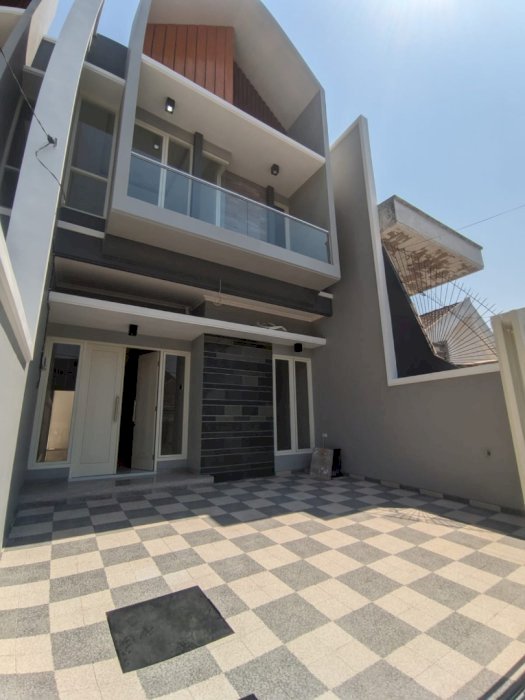 Rumah baru manyar kertoadi model skandinavian