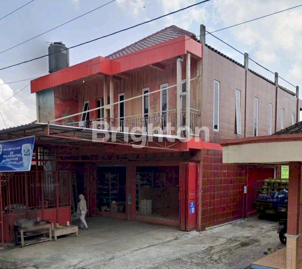 RUMAH KOS YANG TERLETAK DIAREA STRATEGIS PADAT PENDUDUK